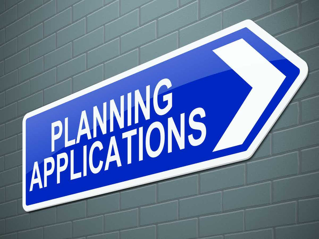Blue and white Planning Applications sign