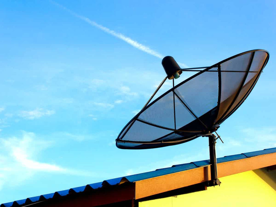 Satellite dish on house roof